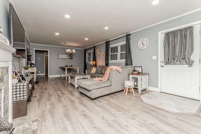 Building Photo - Back porch with a large yard!