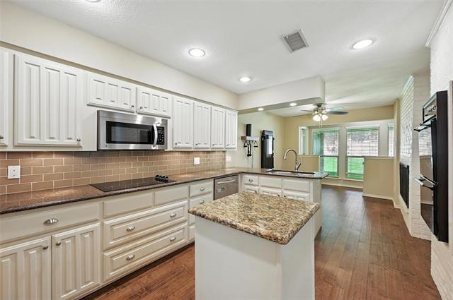 Foto del edificio - 4213 Village Green Dr
