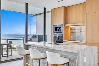 Building Photo - 8701 Collins Ave
