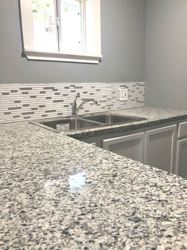 GRANITE COUNTERS - 7813 Detroit St