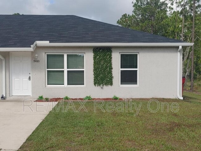 Building Photo - 9480 N Travis Dr