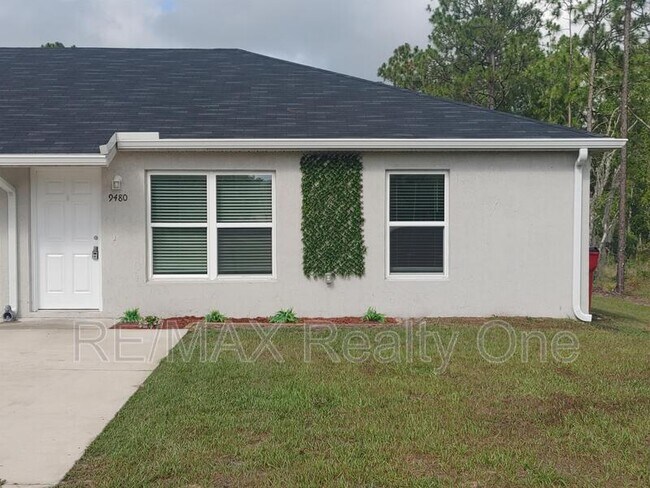 Foto del edificio - 9480 N Travis Dr