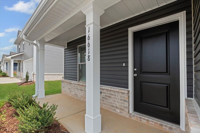Building Photo - New 4BR Home in Whispering Woods – Spaciou...