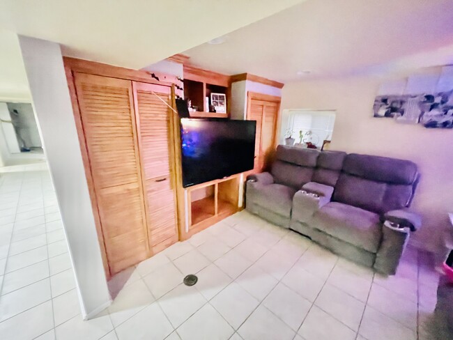 Living room has built in storage - 6310 W Warwick Ave