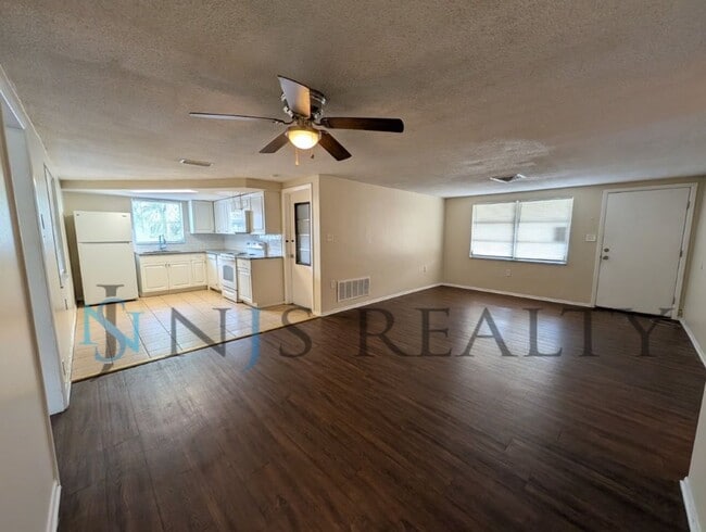 Building Photo - True 3 Bed~2 Bath~with garage. Over 1,000 sq ft, with updated kitchen & bathrooms, large open liv...