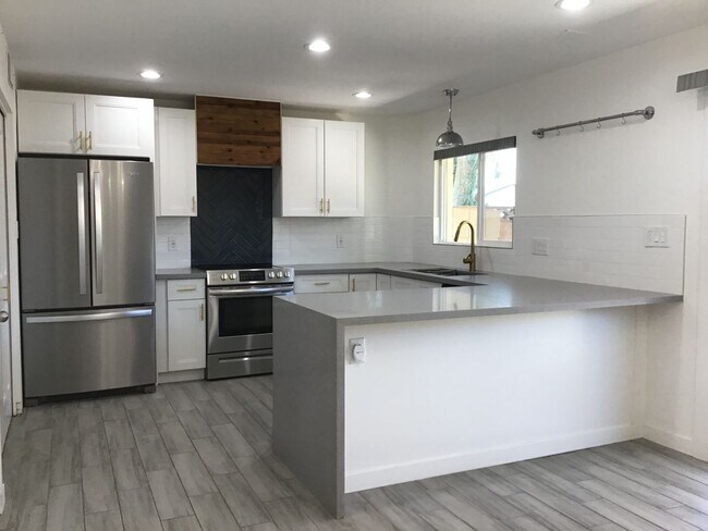 Building Photo - Corner Unit Townhome with Style and Substa...