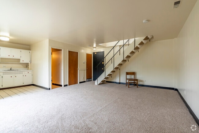 2BR, 1.5BA - 900SF - Living/Dining Room - Tradewind Apartments