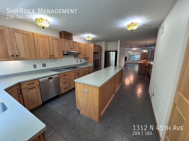 Building Photo - 1312 N 45th Ave E