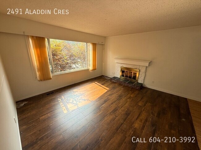 Photo du bâtiment - Spacious 4-Bedroom Home in Abbotsford