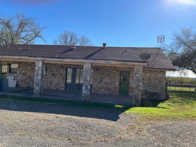 Back side of home and back porch - 10570 San Marcos Hwy