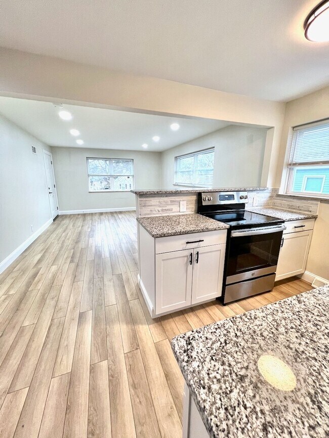Building Photo - Stunning remodel in HOT Madisonville!