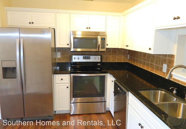 Building Photo - 3 br, 2 bath House - 402 Cashew Drive