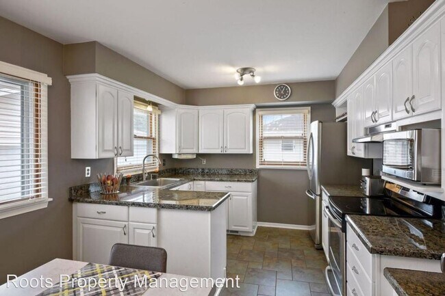 Building Photo - 4 br, 3 bath House - 7018 Girard Ave N