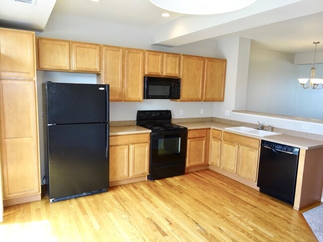 Building Photo - Spacious Two-Bedroom Townhouse with Attach...