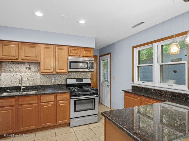 Building Photo - 7753 N Nordica Ave