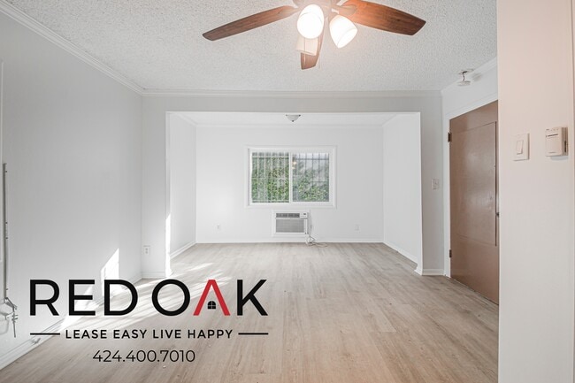 Building Photo - 1309 W 36th Pl