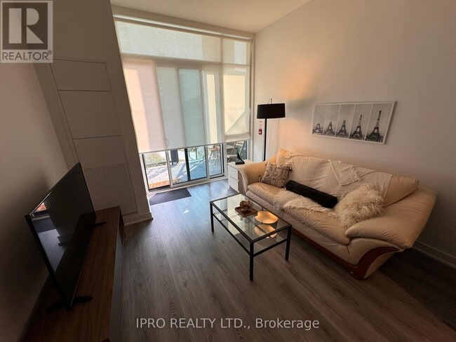 Living room with natural light - 25 Neighbourhood Ln