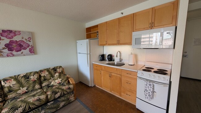 Photo - Fully furnished studio with parking and all utilities at Marine Surf Apartment
