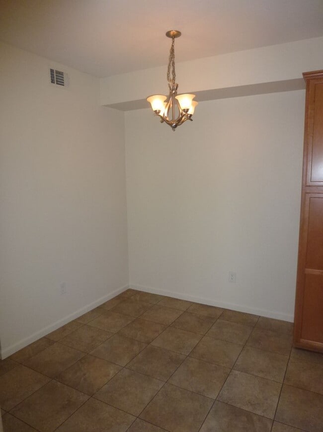 Building Photo - Beautiful Condominium in Gated Community i...