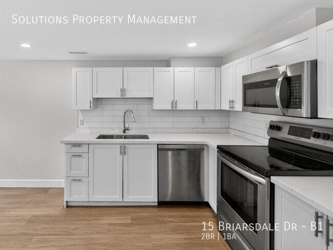 Photo du bâtiment - **NOT Your Typical Basement Suite**