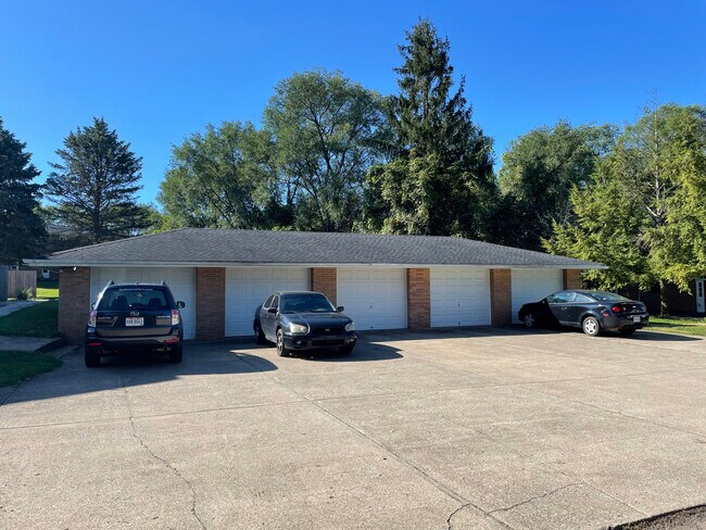 Garage available is the furthest left unit - 8451 Pleasantwood Ave NW