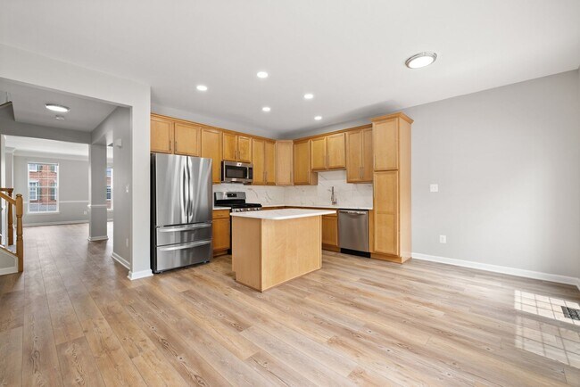 Photo - Spacious Townhome with 2-Car Garage in Bel...