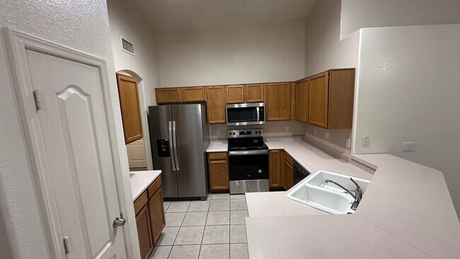 Building Photo - 8560 W Laurel Ln