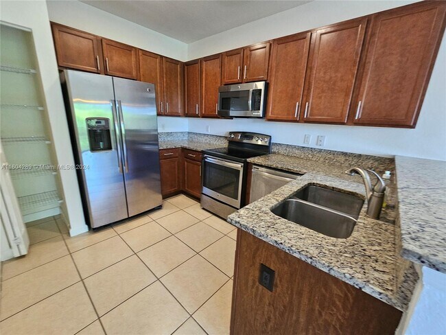 Building Photo - 10630 Northwest 88th Street Apt #208, Dora...
