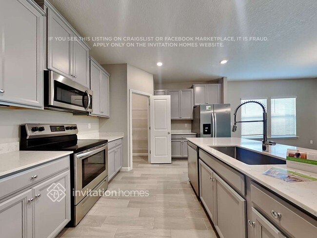 Foto del edificio - 9822 Lemon Grass Ln