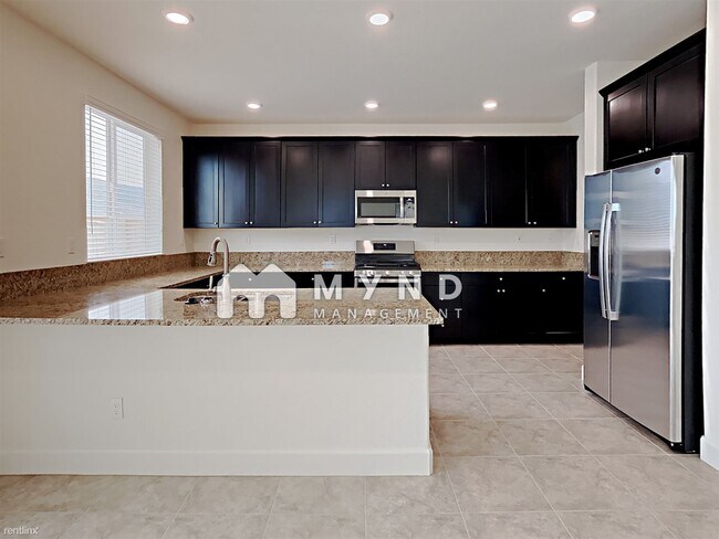 Foto del edificio - 4 br, 3 bath House - 9760 Quartette Dr