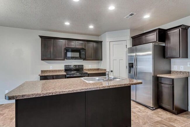 Building Photo - 423 S Spanish Trails Blvd