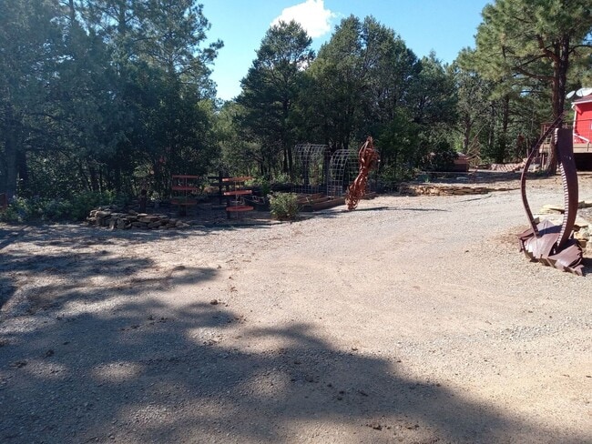 Building Photo - COZY HOME IN THE BEAUTIFUL TOWN OF TIJERAS | Showings available NOW!!