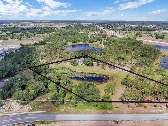 Building Photo - STUNNER! Five Acre Property in Winter Gard...