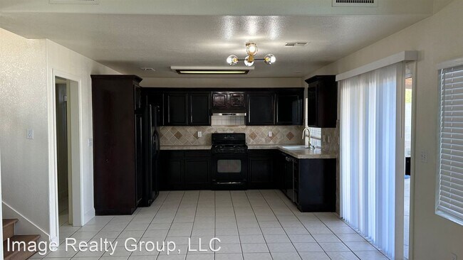 Building Photo - 4 br, 3 bath House - 7970 Kentshire Dr.