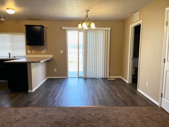 Building Photo - 4 Bedroom Home with Bonus Room Potential & RV Parking!