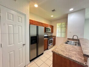 Building Photo - 6055 SW 19th Ct