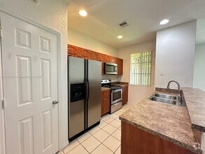 Building Photo - 6055 SW 19th Ct