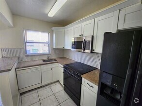 Building Photo - 2400 NW 52nd Ave