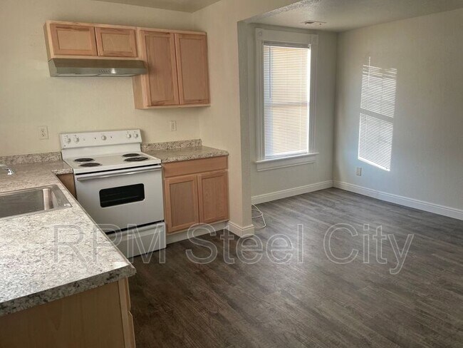 Foto del edificio - 511 W 12th St