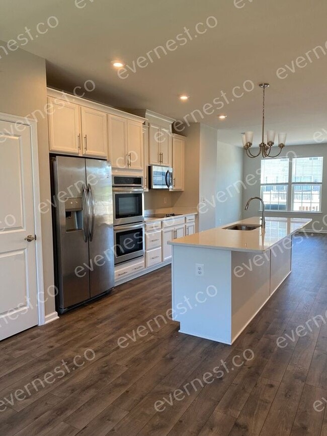 Building Photo - Beautiful 3 Story Townhome - THE LANDING A...