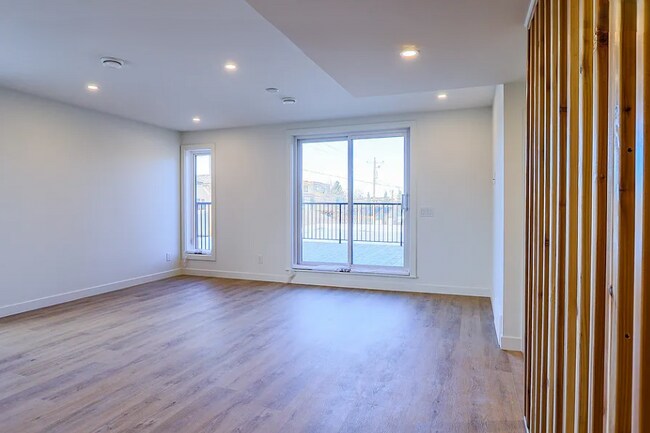 Photo du bâtiment - Modern 3 Bedroom Townhouse in Altadore Com...