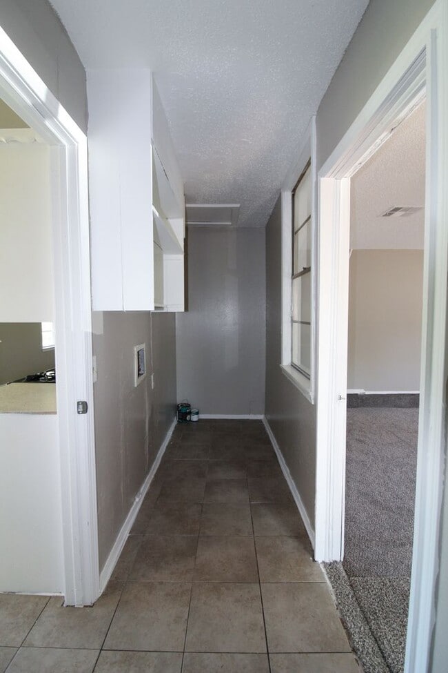 Building Photo - Step into the warmth and charm of this del...