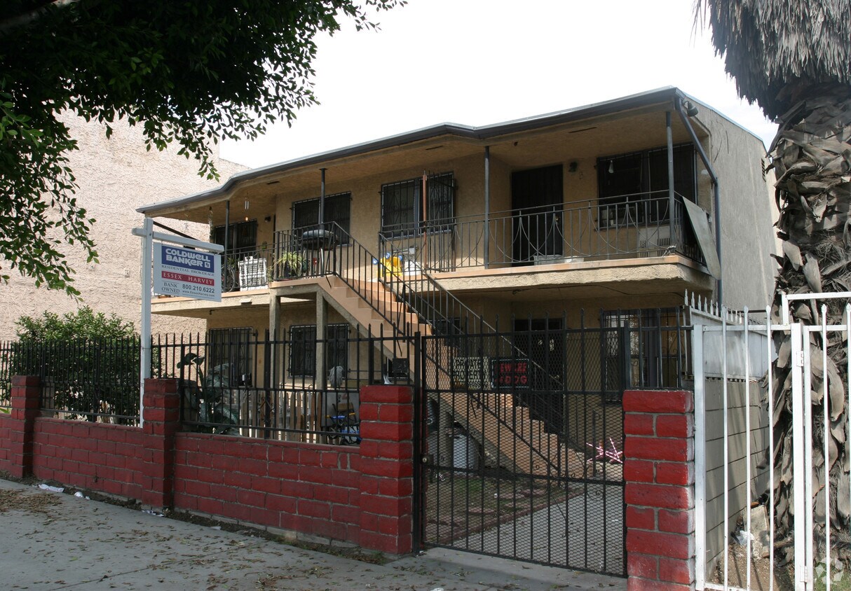 Building Photo - 1841 W Florence Ave