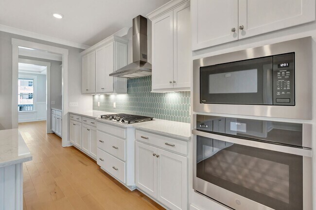 Building Photo - Brand NEW! 4 Bedroom with Gourmet Kitchen ...