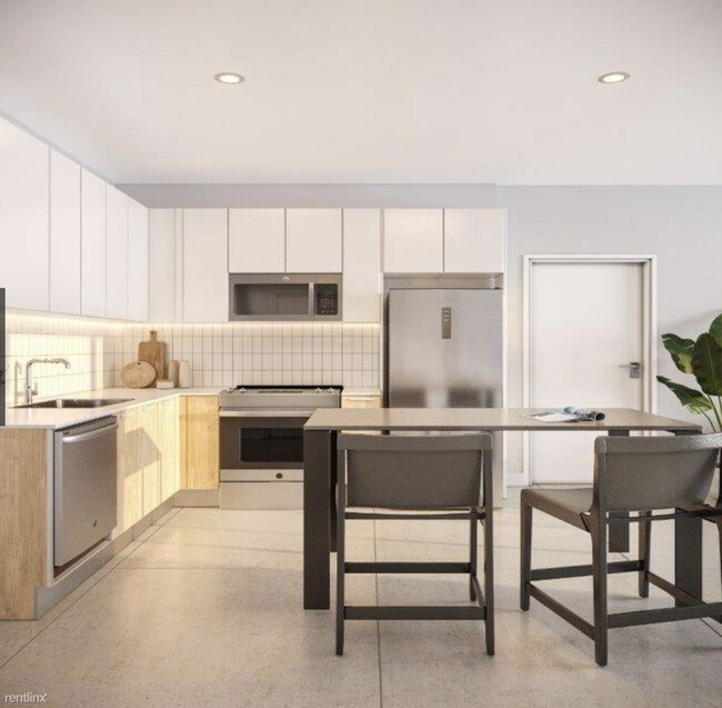 Building Photo - 1 br, 1 bath Condo - 400 NW 26th St New Co...
