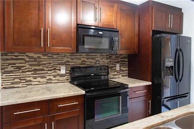 Foto del edificio - 3799 Cocoplum Cir