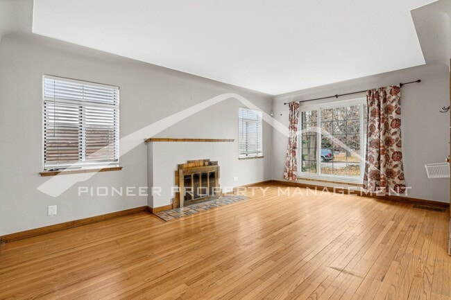 Building Photo - Attractive Brick Tudor With Large Yard In ...