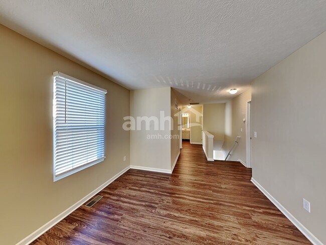 Building Photo - 5556 Lanterns Way Unit 551