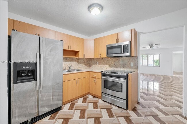 Building Photo - 5320 NW 15th Ct