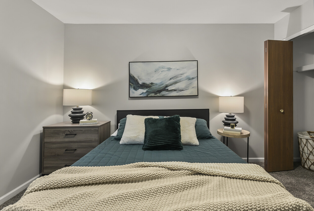 Renovated Bedroom - College Hill Apartments